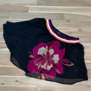 bebe Black silk one sleeve top with Pink Floral Design